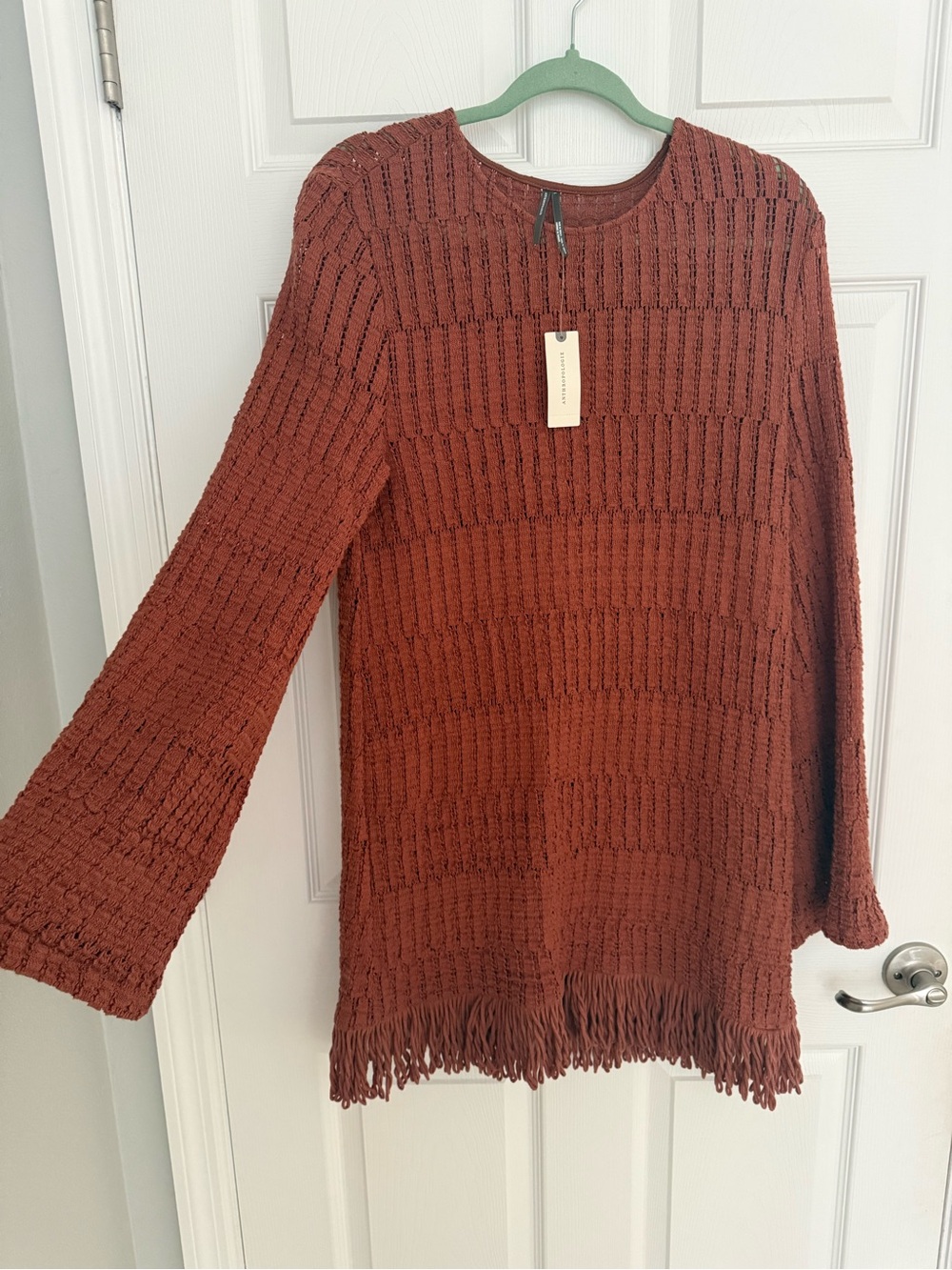 Anthropologie long sleeved knit fringe dress